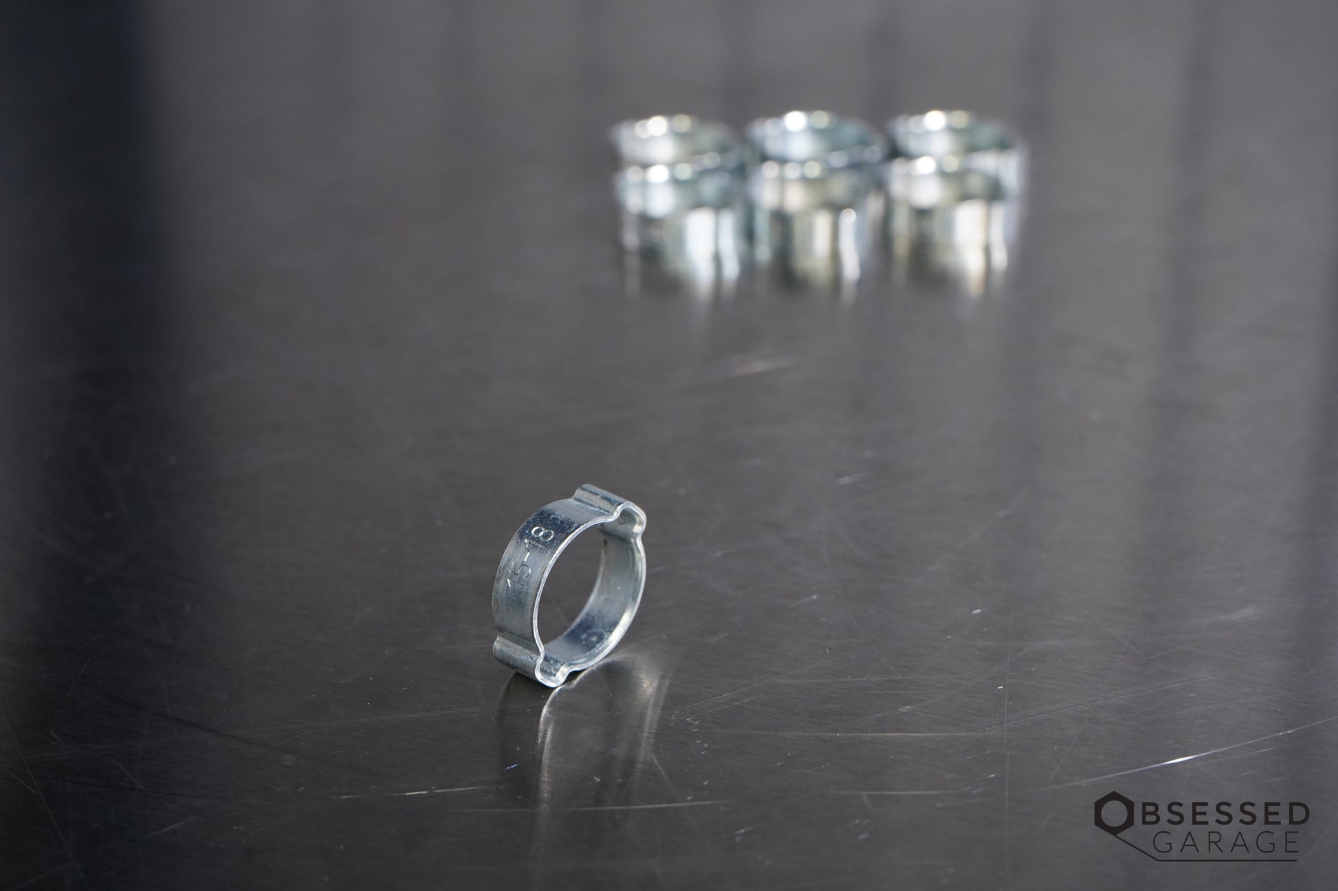 Prevost 1518 Treated Steel Double Ear Clamp Min/Max (In): 0.59-0.71